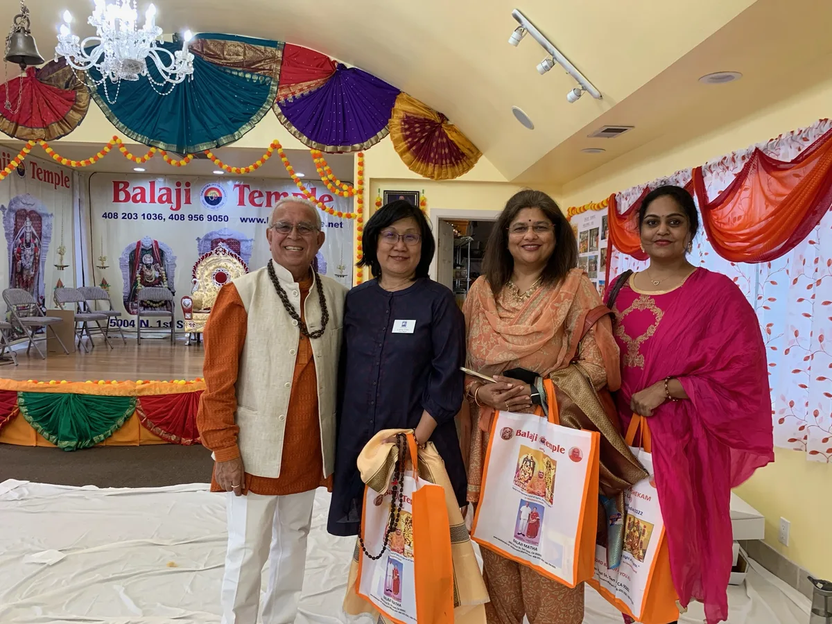 Liang Chao with community members at Balaji Temple
